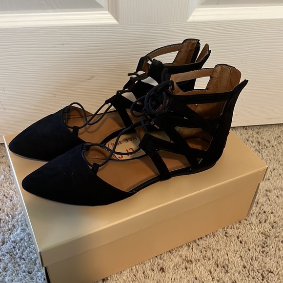 Black lace up, pointy toe flats. - Picture 2 of 4
